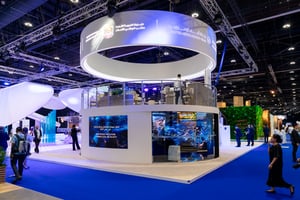 View of the UAE Pavilion with circular elements, LED lighting, and interactive presentation areas for media and technology content.