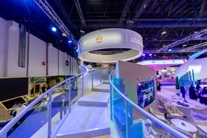 UAE Pavilion at the Global Media Congress in Abu Dhabi featuring futuristic design, curved white structures, and digital displays.