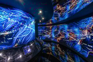 Interior of the UAE Pavilion showcasing impressive LED walls displaying dynamic digital content and data visualizations.