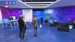 Screenshot of Haufe's digital exhibition stand with buttons floating the room, visible seating areas and virtual people.