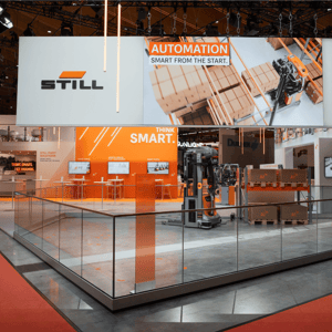 STILL’s exhibition stand featuring automated industrial trucks, intralogistics solutions and digital warehouse automation for industry.