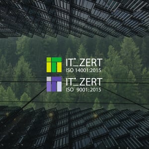 ISO 14001 logo and ISO 9001 logo on top of a background that showcases a futuristic building in front of a green forest.
