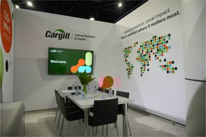 Cargill meeting room at IPPE 2026 featuring a global presence wall graphic and the new rebrand aesthetic.