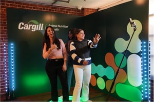 Attendees posing in front of the Cargill rebrand photo wall at the Terminus 330 Event during IPPE 2026.