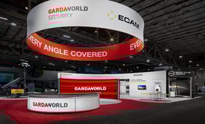 GardaWorld exhibition booth with red highlights and a big red ring above the booth