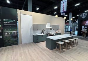 LX Hausys exhibition booth at TISE 2025, with a show kitchen