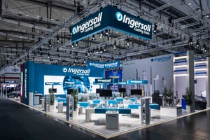 IMC Group booth at EMO 2025 featuring Ingersoll branding, blue design, and display areas for precision tools.